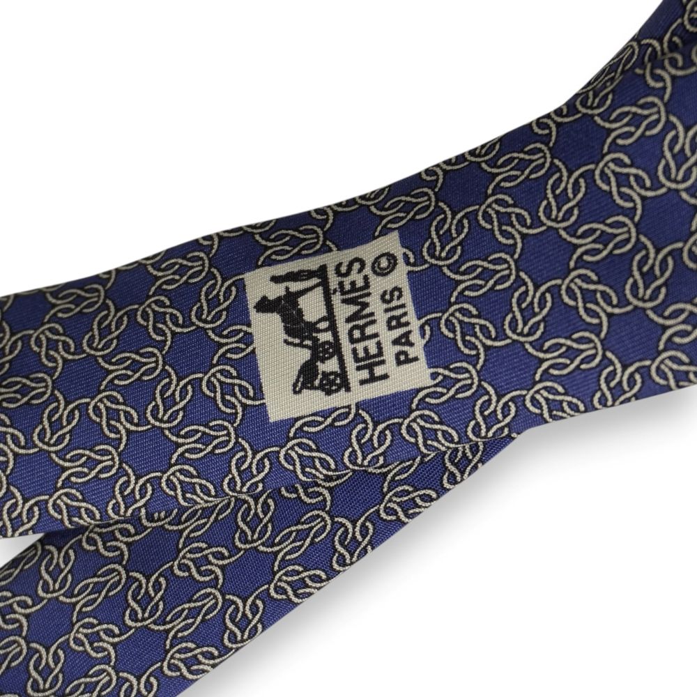 Cravatta Hermès Paris vintage - Seta blu reale con motivo geometrico oro