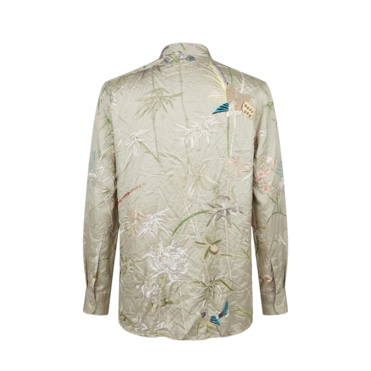 Retro della camicia in seta Gucci con ricamo di bambù e uccello esotico.