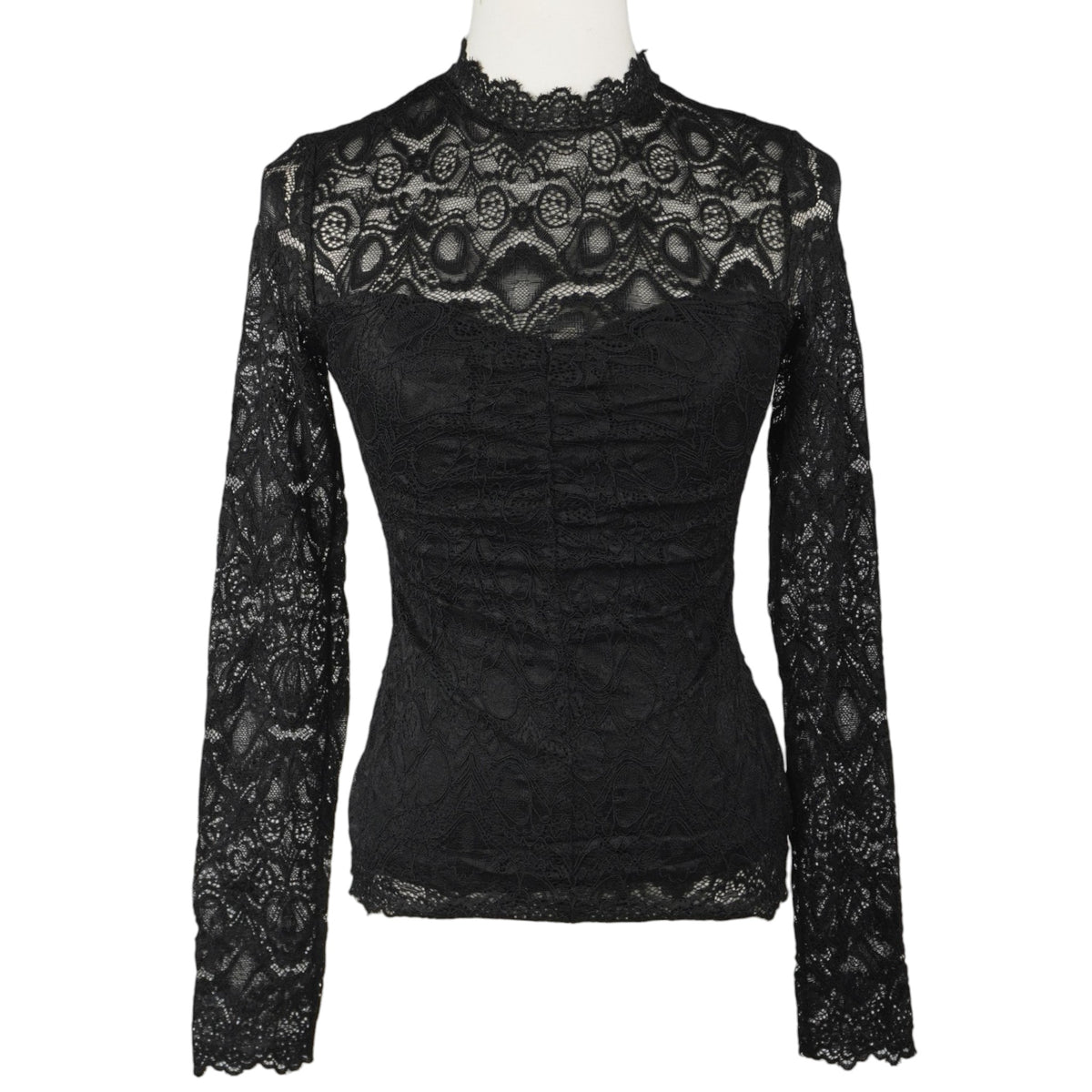 Vista frontale completa della maglia a maniche lunghe in pizzo nero Guess.