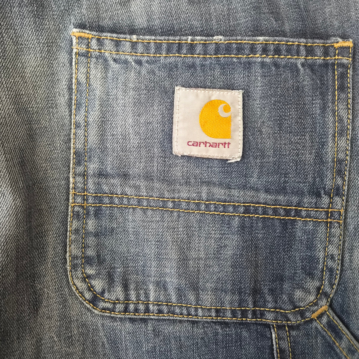 pantalone Carhartt Fort Pant - Schiariture e baffature sul denim - Vista intera in piano