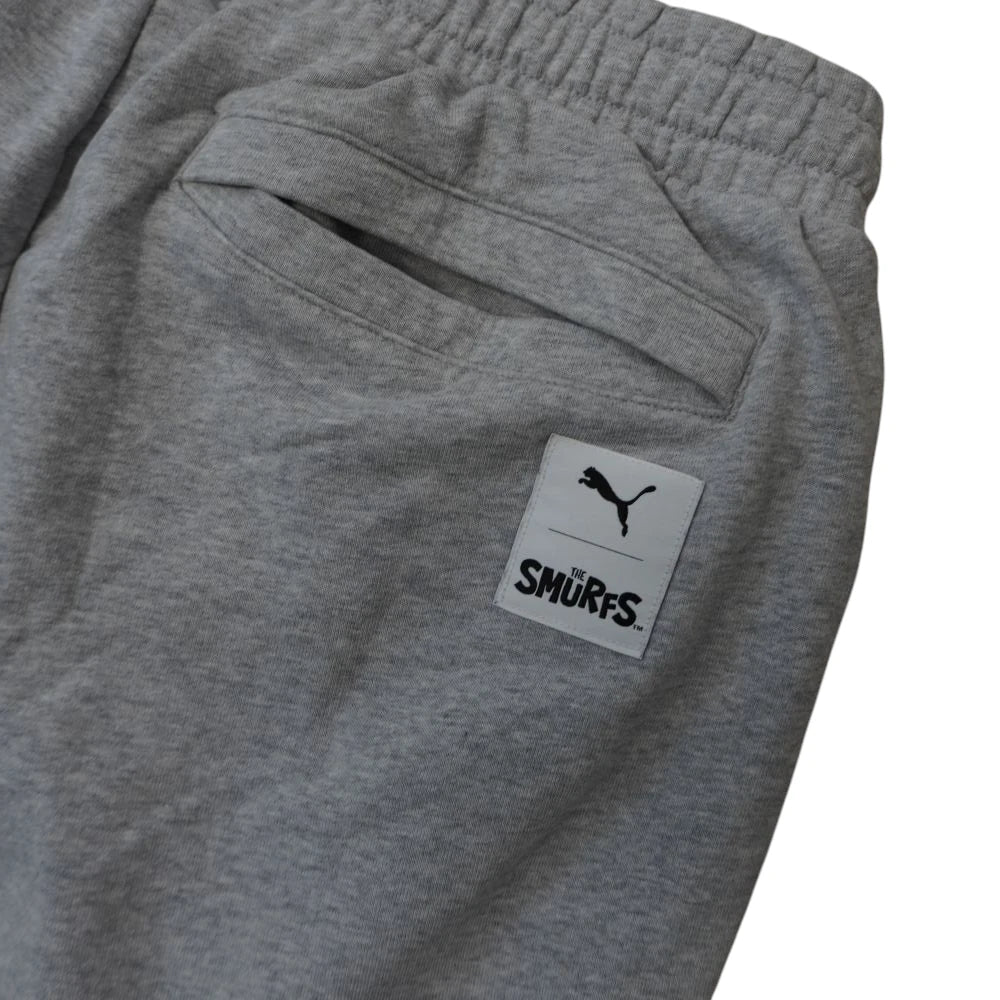 pantaloni-tuta-jogger-grigio-melange-puma-x-the-smurfs-i-puffi-ricami-personaggi-tasca-dietro
