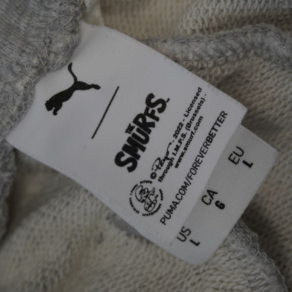 pantaloni-tuta-jogger-grigio-melange-puma-x-the-smurfs-i-puffi-ricami-personaggi-tasca-dietro